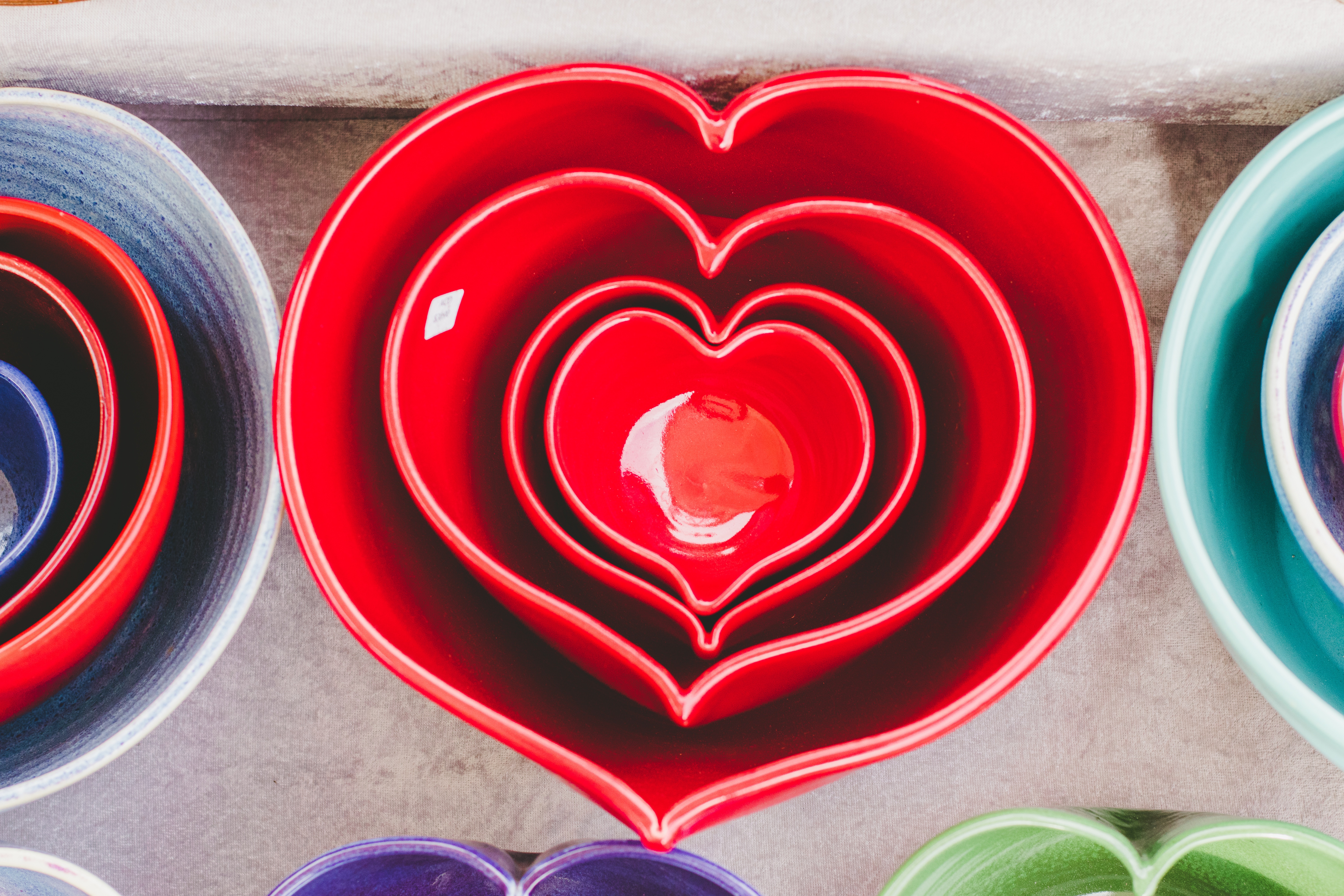 Several heart shaped bowls of various sizes