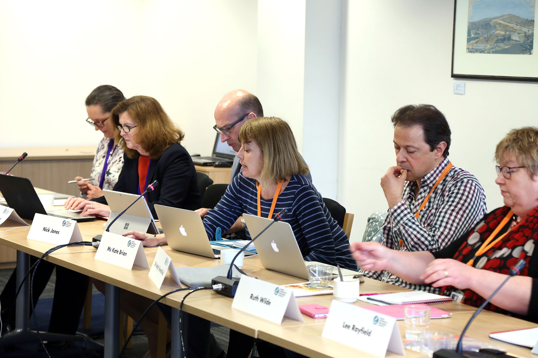 Members of the HFEA board sat along a table during an Authority meeting